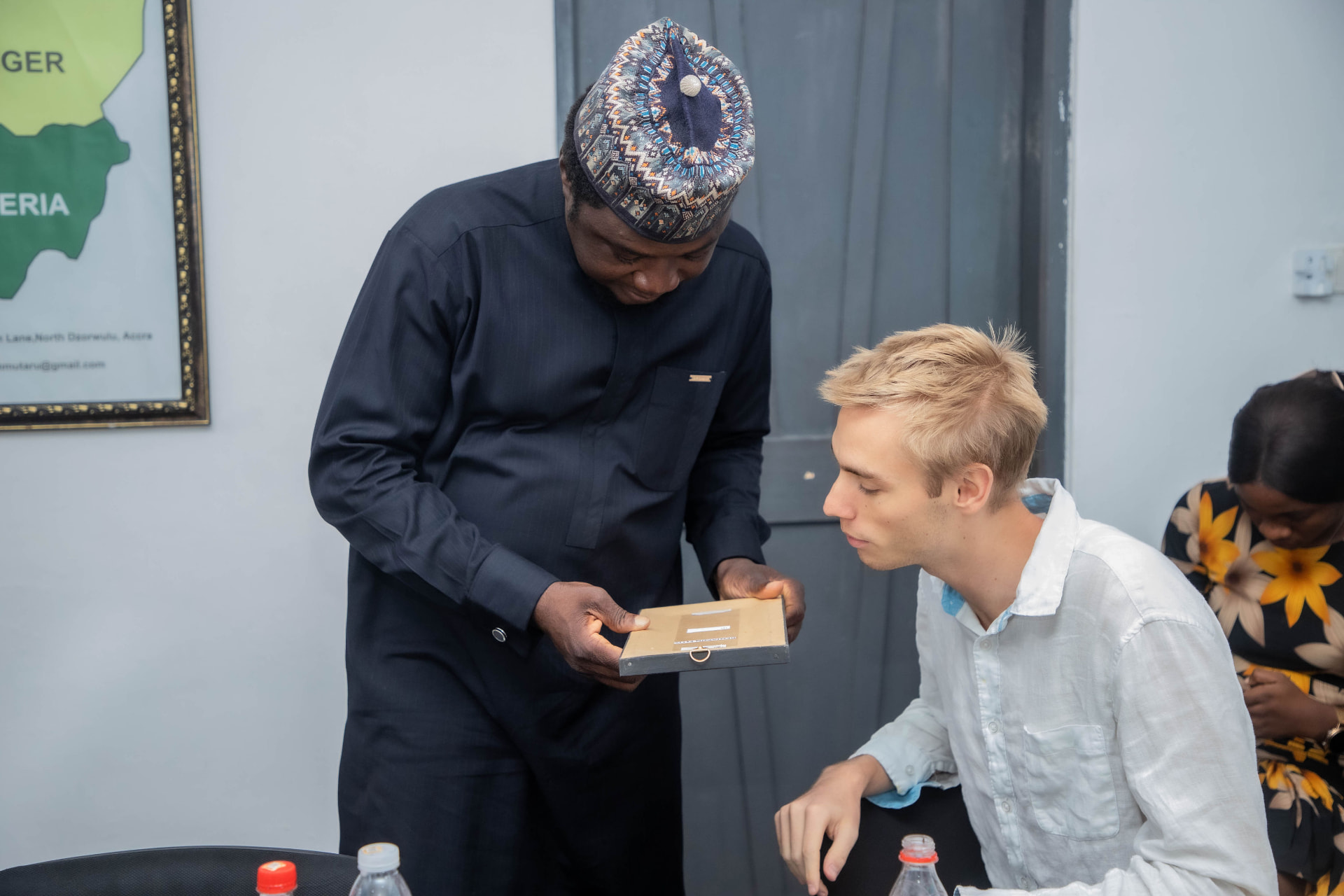 GC Brothers representative with an international client during a business meeting in Accra