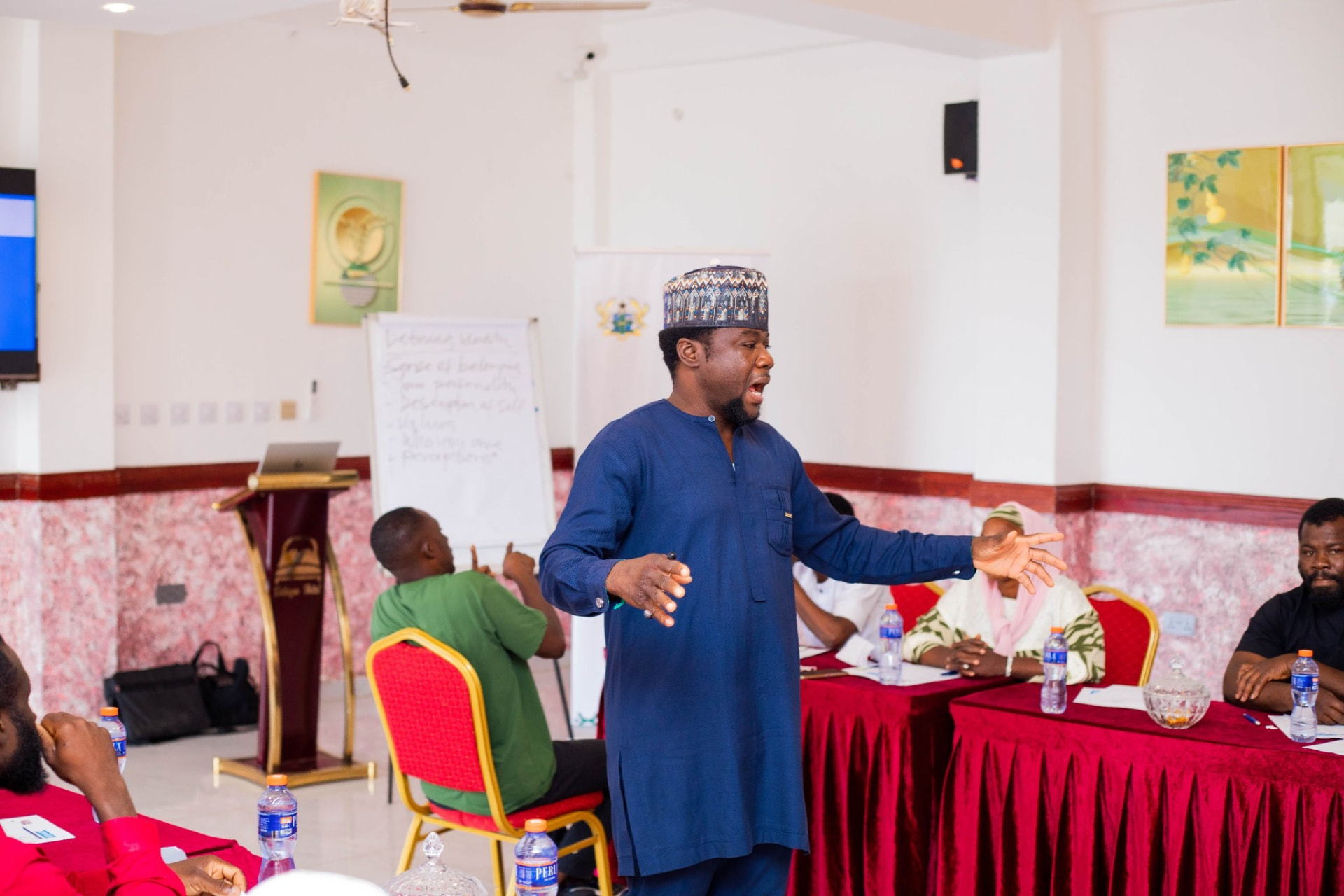 Speaker addressing a community workshop audience